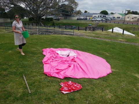 Charlotte Parallel installing her work, NZ Sculpture OnShore 2012; photo by Rob Garrett