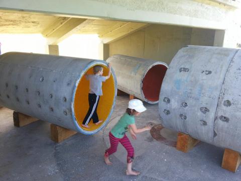 Children at play in Miriam van Wezel's project at Sculpture OnShore.