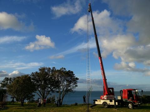 Installing Gary Smith's Really High!? 2012, NZ Sculpture OnShore 2012; photo by Rob Garrett