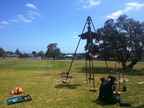 Jamie Pickernell installing his work, NZ Sculpture OnShore 2012; photo by Rob Garrett