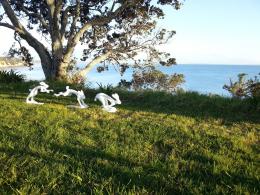 Nick Dryden's Running Hares on the clifftop at NZ Sculpture OnShore