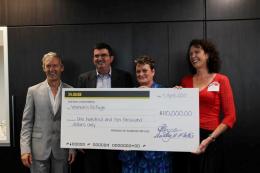 Rob Garrett, Erich Bachmann, Heather Henare, Alix Bachmann with the presentation of $110,000 to Women's Refuges of New Zealand; photo courtesy of Hesketh Henry