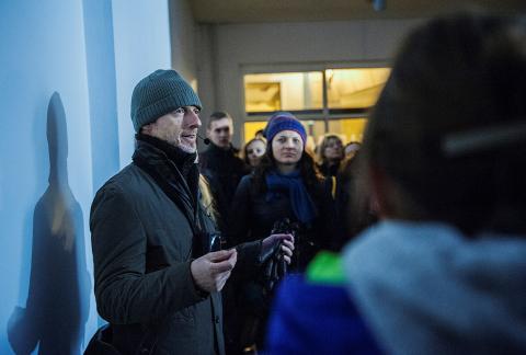 Rob Garrett giving curator’s tour;  photo by Bogna Kociumbas