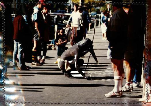 Rob Garrett, Streetwork with bird mask, 1987, Hastings, New Zealand; photo by Stephanie Garrett