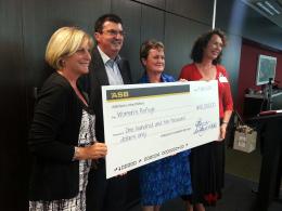 Sally Dewar, Erich Bachmann, Heather Henare and Alix Bachmann with a donation of $110,000; photo by Rob Garrett