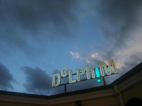 Twilight at NZ Sculpture OnShore with Paul Hartigan's new neon work DoLPhiM