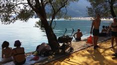 Visitors to Christo and Jeanne-Claude's The Floating Piers,  on the shore of Monte Isola, Lake Iseo, Italy; photo by Rob Garrett